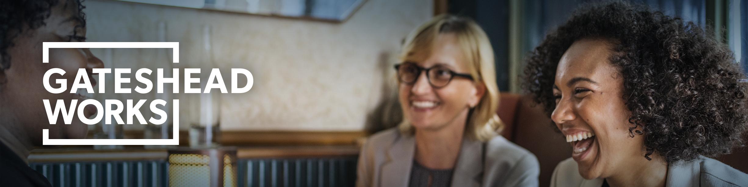 An image of people smiling and laughing