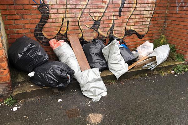 Fly tipped rubbish in Brinkburn Ave back lane