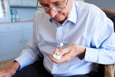 Telecare services A photo of an older gentleman using telecare technology.