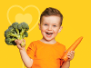 young boy with vegetables