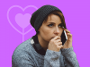 lady in a woolly hat on a mobile phone