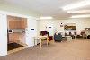 Communal lounge with view of kitchen