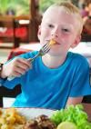 Boy enjoying school lunch